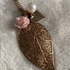 Long gold leaf with pearl heart and rose necklace